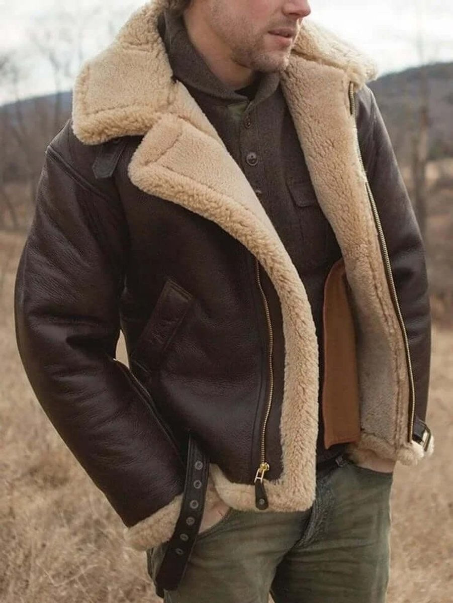 Close-up shot of brown shearling coat highlighting thick tan fleece lapel