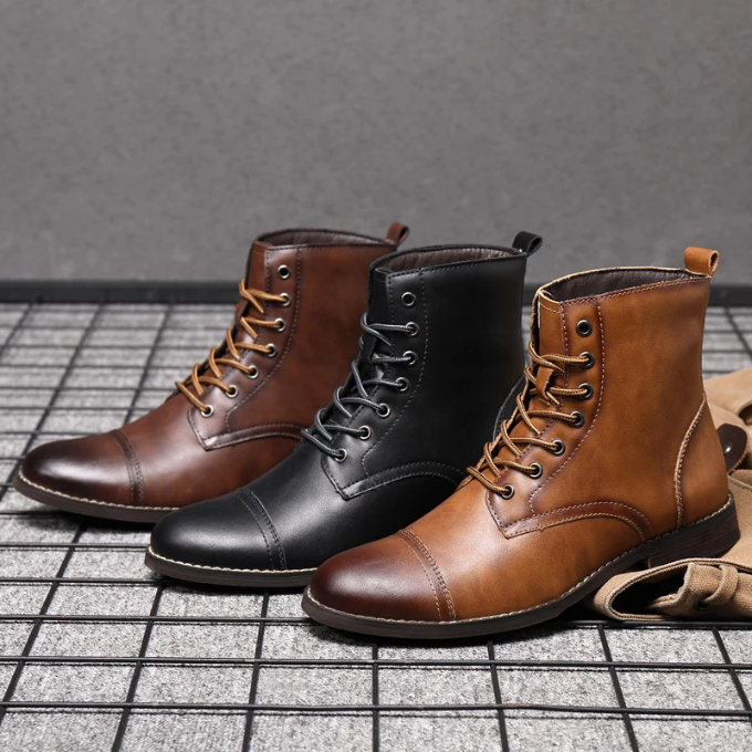 Black, dark brown and tan leather ankle boots lined up together