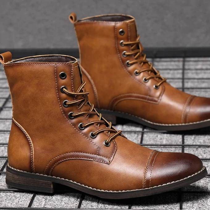 Tan leather ankle boots with cap toe and stacked heel