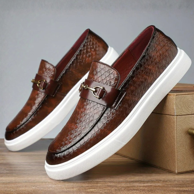 Brown snakeskin-effect leather loafers with gold snaffle detail and white sole