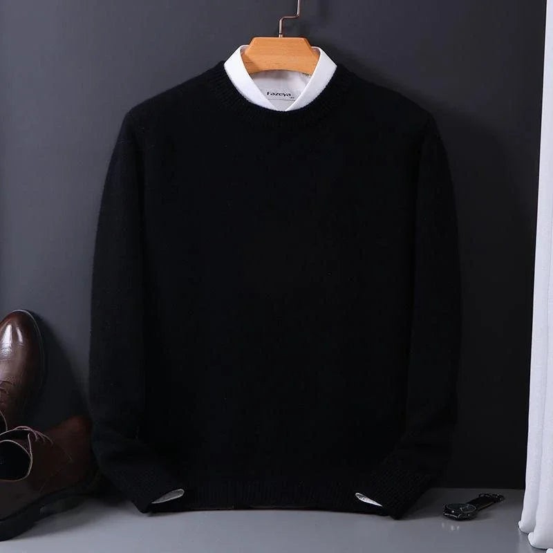 Black mock-neck jumper paired with crisp white shirt collar
