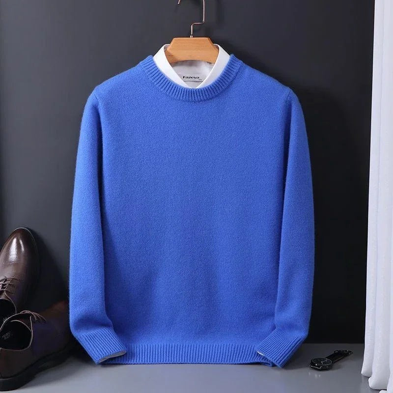 Cobalt blue mock-neck jumper hanging above brown leather shoes