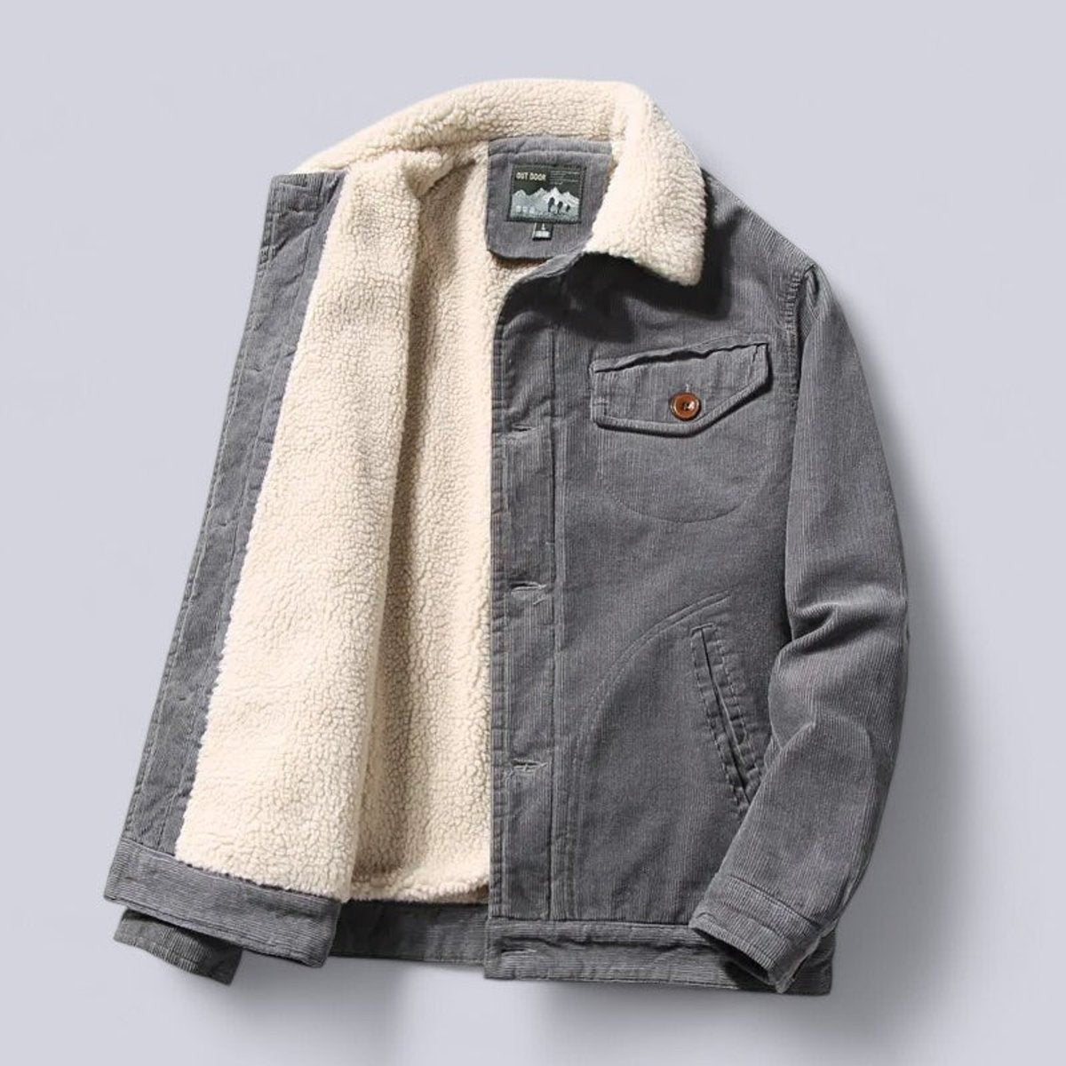 Grey corduroy jacket open showing cream sherpa fleece lining