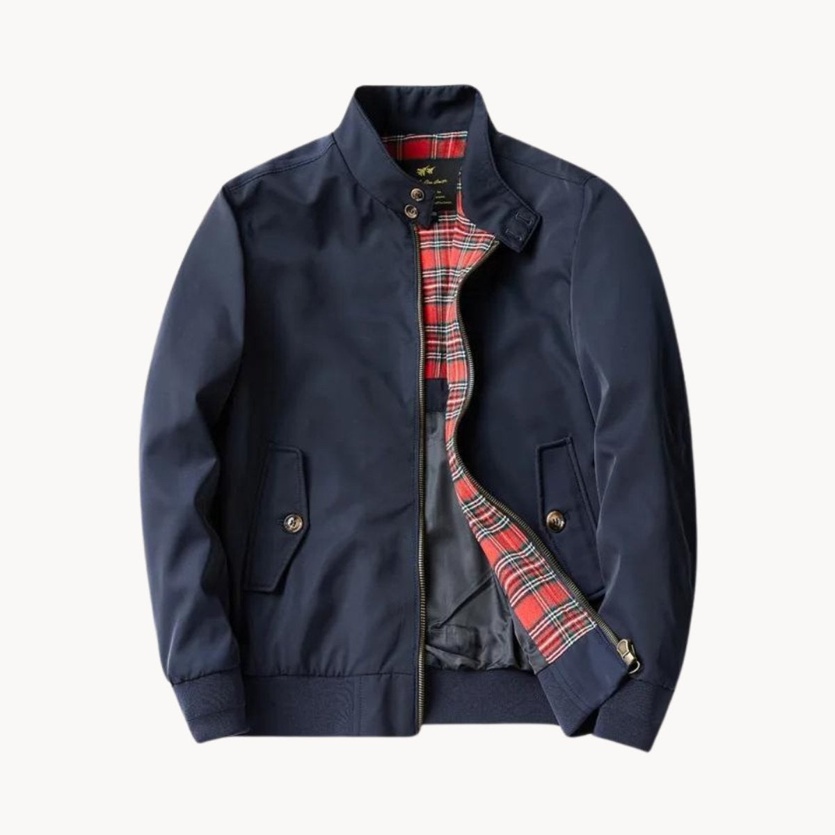 Navy Harrington bomber jacket with red tartan lining and stand collar