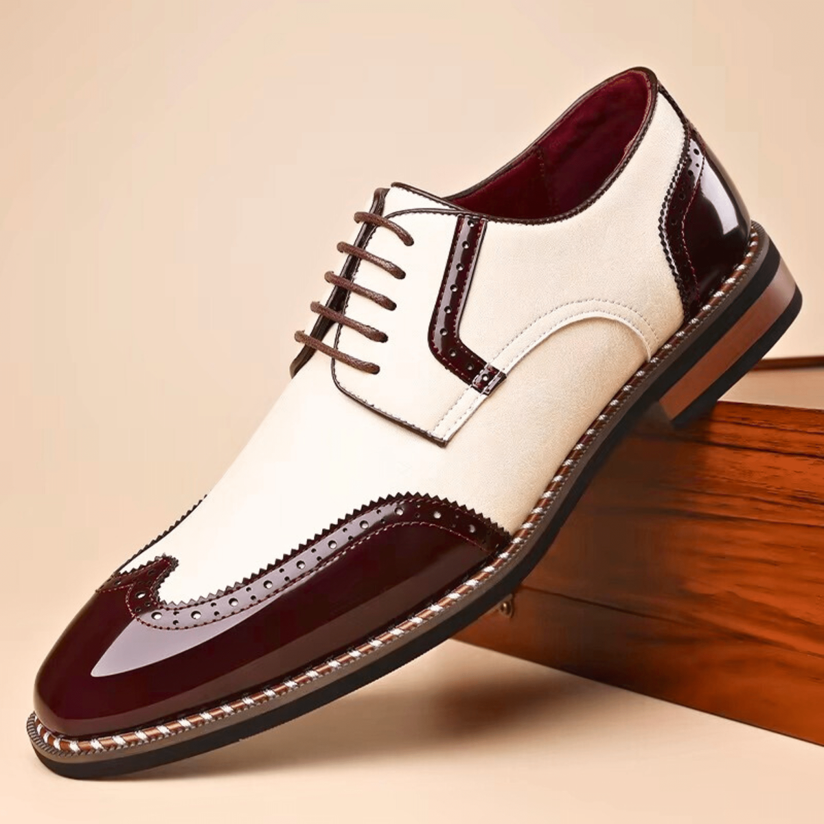 Cream suede and burgundy patent brogue shoe with contrasting lace-up design