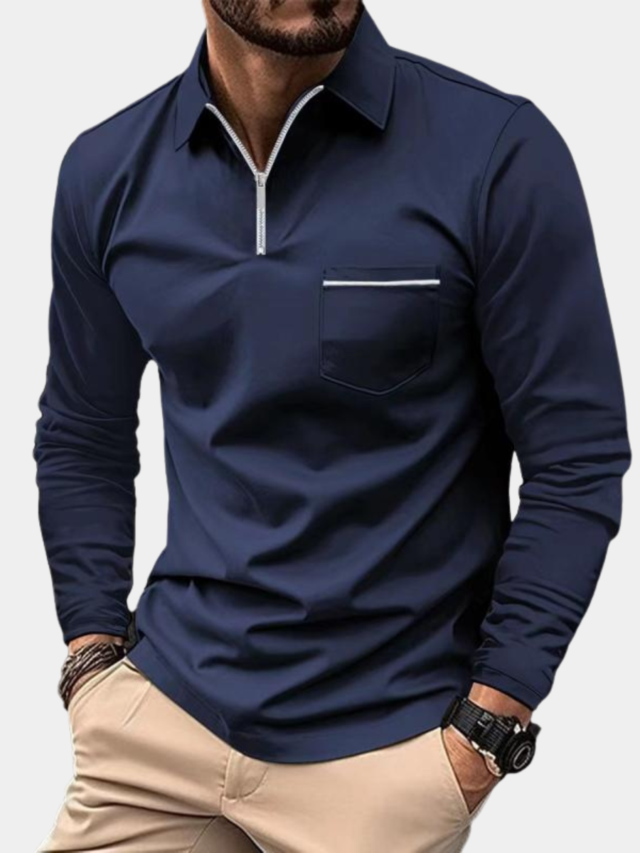 Navy long sleeve polo shirt with zip collar and chest pocket, worn by man